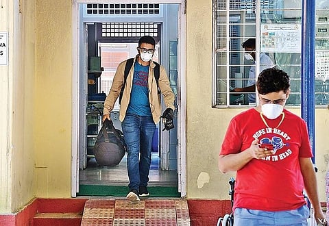 A youth who returned from China comes out of Rajiv Gandhi Institute of Chest Diseases after getting tested for coronavirus in Bengaluru on Wednesday. (Photo| Shriram BN, EPS)
