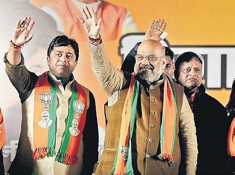 Home Minister Amit Shah with BJP’s New Delhi constituency candidate Sunil Yadav at an election campaign rally at BK Dutt colony on Wednesday | Shekhar Yadav