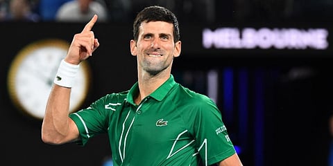 Novak Djokovic celebrates after beating Roger Federer during their men's singles semi-final match on day eleven of the Australian Open tennis tournament in Melbourne. (Photo | AFP)