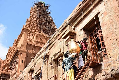 Renovated kalasam re-installed atop Big Temple tower