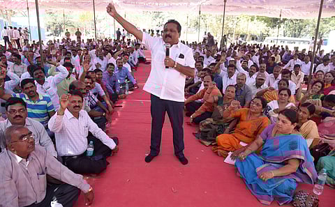 Government college lecturers stage a protest to highlight their various demands at Freedom Park on Thursday. (Photo| Nagaraja Gadekal, EPS)