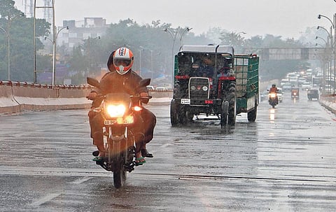 A rain drenched road in Bhubaneswar on Friday. (Photo | Irfana, EPS)