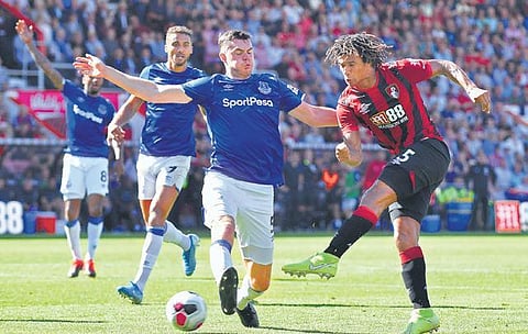 Bournemouth defender Nathan Ake (right) is one of the transfer targets as Mikel Atrteta is looking to strengthen the Gunners’ backline