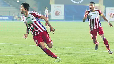 Michael Soosairaj (left) celebrates after scoring against Mumbai City FC on Saturday