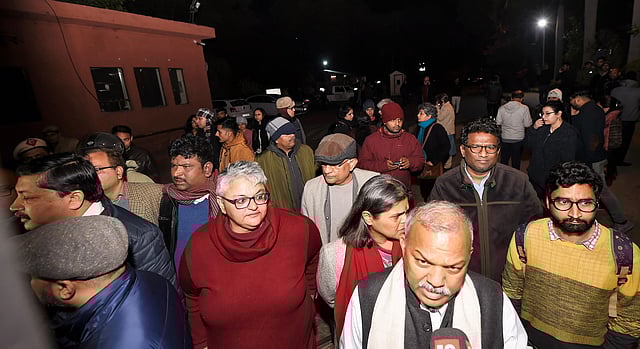 JNU professors walk in solidarity with students after miscreants wreaked havoc on campus. (Photo | PTI)
