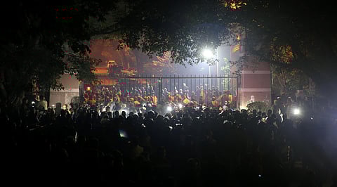 Police and others at out side of the JNU campus after some masked miscreants attacked in the campus New Delhi on Sunday. (Photo | ES/Shekhar Yadav)