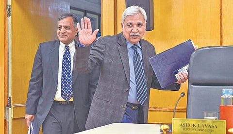 Chief Election Commissioner Sunil Arora (right), along with Election Commissioner Ashok Lavasa, arrives for a press conference at the EC headquarters in New Delhi on Monday to announce the schedule for the Delhi Assembly elections | PTI