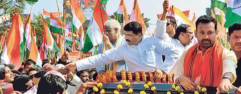 Union Minister Dharmendra Pradhan during public awareness campaign in Cuttack on Monday. (Photo | EPS)