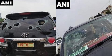 YSRCP MLA Pinnelli Ramakrishna Reddy's car vandalised on National Highway 16 near Chinna Kakani village in Guntur district during farmers protest demanding Amaravati to be retained as the only capital in Andhra Pradesh. (Photo | ANI)