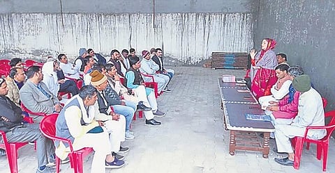 Nauksham Chaudhary (in red salwar) addresses a gathering of 50-60 people and  visits 5-6 villages in Muslim-majority Mewat everyday | Express