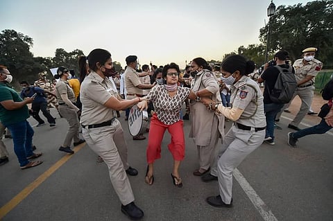 Members of AISA and Bhim Army detained by police during a protest against the death of a Dalit woman who was gang-raped in Hathras UP in New Delhi Wednesday Sept. 30 2020. (Photo | PTI)