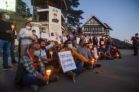Congress activists hold a candlelight protest march demanding justice for Hathras rape case victim in Shimla Wednesday Sept. 30 2020. (Photo | PTI)