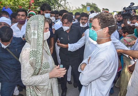Congress leader Rahul Gandhi along with AICC General Secretary Priyanka Gandhi Vadra after police personnel allegedly pushed him while he was on his way to Hathras (Photo | PTI)