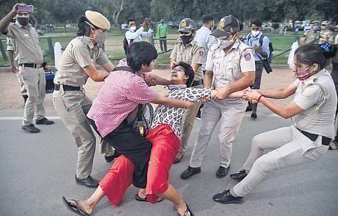 AISA members being detained by police during their protest over the death of Hathras gang rape victim at Rajpath in New Delhi. (Photo | Parveen Negi, EPS)