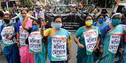 Trinamool Congress women activists led by Chandrima Bhattacharya take part in protest rally against the Hathras incident, in Kolkata. (Photo| PTI)