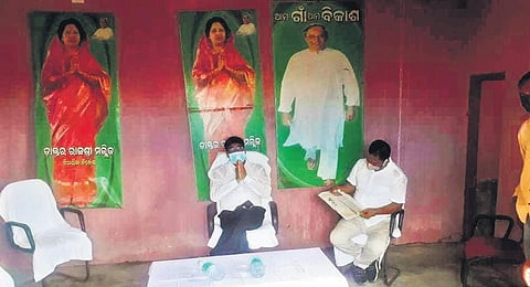 Sahu greeting party workers at the meet on Friday. The posters behind Sahu describing MP Rajashree Mallick as Tirtol MLA. (Photo | EPS)