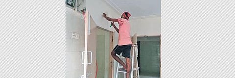 Workers renovate a cottage in  Tirumala on Friday | Express