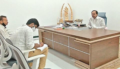 Chief Minsiter K Chandrasekhar Rao shares details of his properties with the  Village Secretary at his Erravalli farmhouse on Saturday