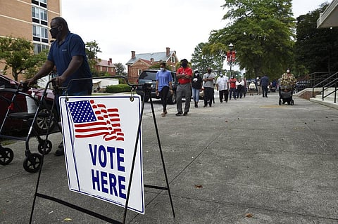 People showed up by the hundreds to cast their ballot early in Georgia. (Photo| AP)