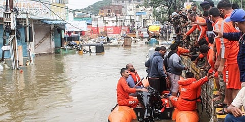 NDRF teams are also actively involved in relief operations and have so far rescued 72 people from flood-hit Meerpet area on the city outskirts. (Photo | Vinay Madapu, EPS)