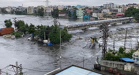 Flood water passing under Moosarambagh bridge after 13 gates of the Himayatsagar reservoir were lifted in Hyderabad. (Videograb)