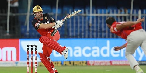 RCB's Aaron Finch plays a shot against KXIP at Sharjah Circket Stadium. (Photo | ANI)