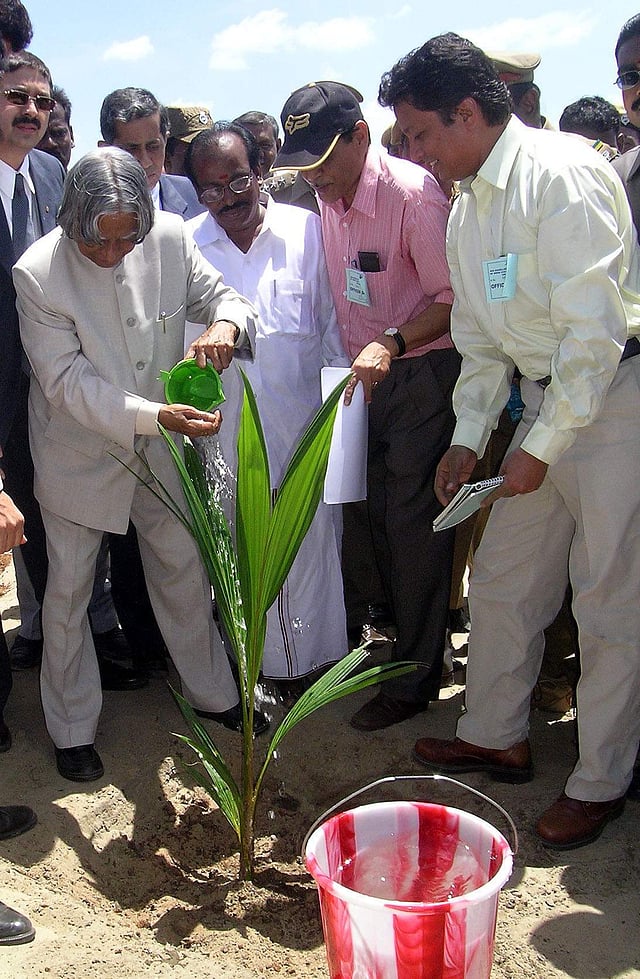 Then President Abdul Kalam plants a coconut palm at Keechankuppam shore in Nagapattinam to remember the children who died in the devastating 2004 Tsunami. (File Photo | EPS)