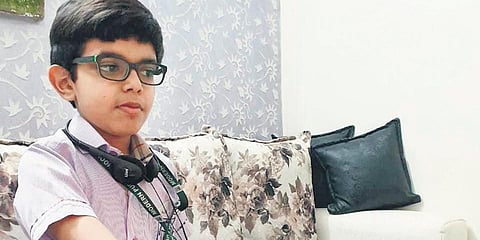 Hiten Gautam's device reminds those walking into its radius to maintain distance . (Photo| EPS)