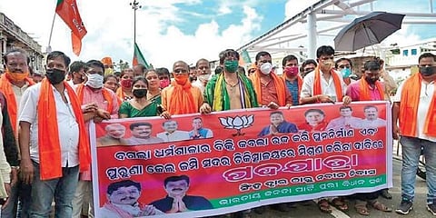 BJP members during the padayatra to Naveen Niwas. (Photo | EPS)