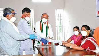 Former minister T B Jayachandra files his nomination papers accompanied by  KPCC president D K Shivakumar and opposition leader Siddaramaiah on Thursday