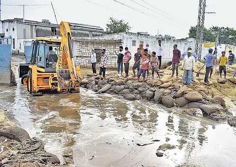 Bags of soyabean destroyed at a godown near Bandlaguda