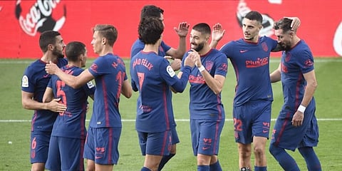Atletico Madrid players celebrate scoring a goal during the Spanish La Liga match against Celta Vigo. (Photo | AFP)