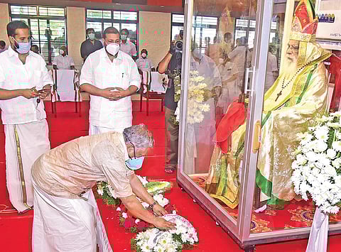 Forest Minister K Raju paying his last respects to Joseph Mar Thoma Metropolitan who passed away in Tiruvalla  on Sunday | Shaji Vettipuram