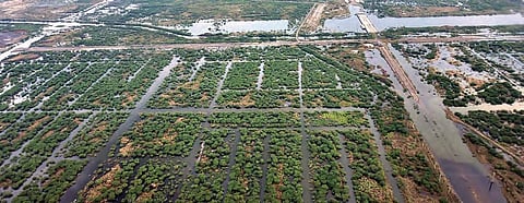 Chief Minister YS Jagan Mohan Reddy conducts an aerial survey of flood-affected regions in Krishna and Guntur districts on Monday | Express