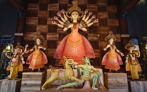 Idols of Goddess Durga and other deities at a community puja pandal during Durga puja festival in Kolkata Monday Oct. 19 2020. (Photo | PTI)