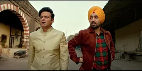 Manoj Bajpayee (L) and Diljit Dosanjh in 'Suraj Pe Mangal Bhari'. (Photo| YouTube screengrab)