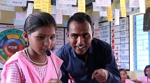 Ranjitsinh Disale, 31, arrived at the Zilla Parishad Primary School in Paritewadi village in Solapur district in 2009 when it was a dilapidated building. (Photo | Twitter Screengrab)