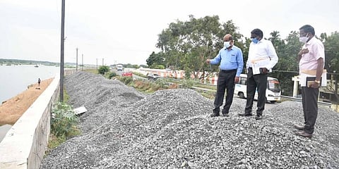 Tiruchy District Collector S Sivarasu overseeing the construction of Tiruchy-Karur highway near Tiruchy on Tuesday morning. (Photo | EPS)