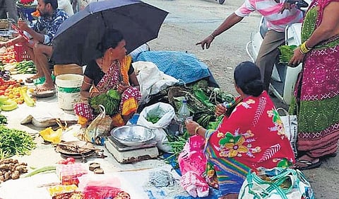 A woman selling colourful threads ahead of ‘Bhai Juintia’ festival in Sambalpur | Express