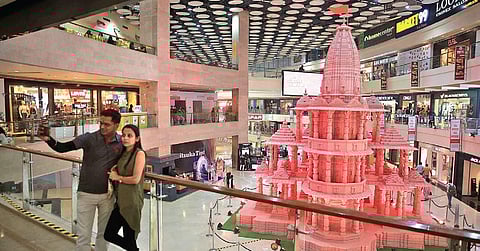 Visitors click a selfie with Ayodhya’s Ram Temple model in background at the Pacific Mall in Tagore Garden | Express