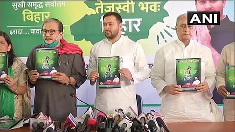 Rashtriya Janata Dal leader Tejashwi Yadav releases party's manifesto. (Photo| ANI)