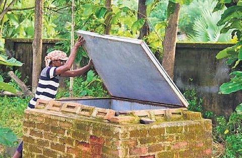 Phagu Minz inspects the Sabji Cooler installed in his village. (Photo| EPS)