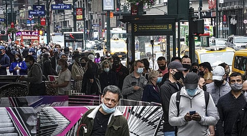 Voters wait in line for blocks to cast votes at the Madison Square Garden early voting polling site, Saturday Oct. 24, 2020, in New York. (Photo | AP)