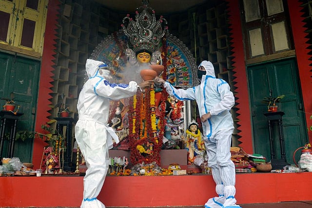 Durga Puja traditions, carried out by many households from centuries in West Bengal, saw low turnouts this year. (Photo| PTI)
