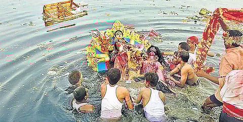It is still not clear if there is any bar on the number of people who can accompany the idol till the immersion ghat. 