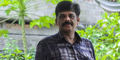 Additional SI CK Raju of Thodupuzha police station (Photo| Special Arrangement)