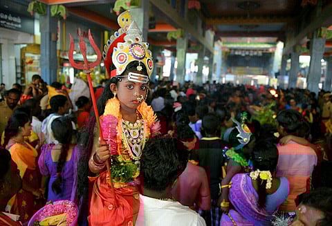 Small children in different costumes arrive at the Mutharamman temple (File photo | A Raja Chidambaram)
