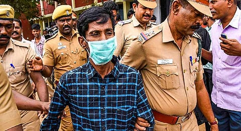 Murugan, alleged mastermind behind burglaries at Lalithaa jewellery and Punjab National Bank, Tiruchy. (Photo / Express)