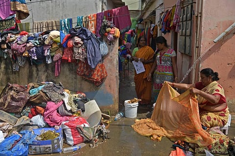 Residents hang clothes out to dry at Hosakerehalli. (Photo | Meghana Sastry, EPS)