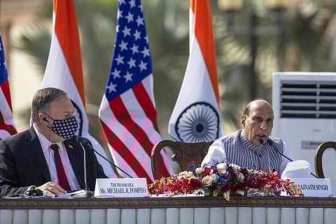 U.S. Secretary of State Mike Pompeo listens to Indian Defence Minister Rajnath Singh during a joint press conference at Hyderabad House in New Delhi, India, Tuesday, Oct. 27, 2020. (Photo | AP)